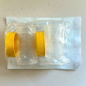 NWT medela colostrum collection and storage containers. Medela pump compatible.